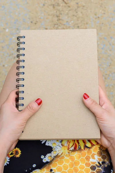 Woman holding a book — Stock Photo, Image