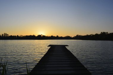 Günün sonunda rıhtıma gel.
