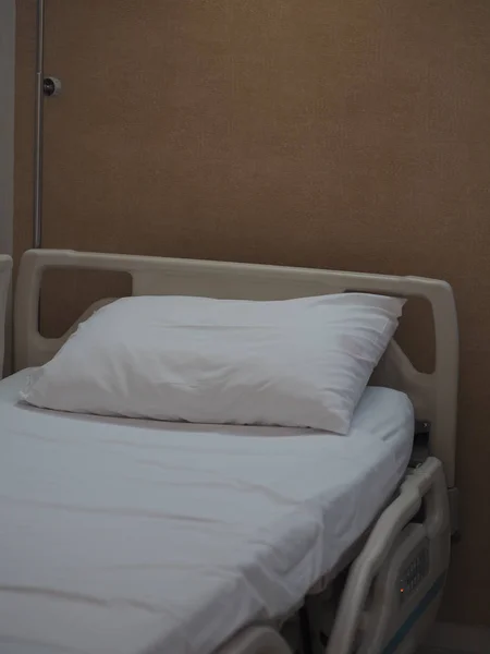 White pillow on Patient bed in ward room hospital without patient