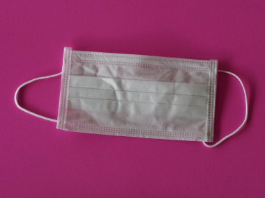 toz ve mikroplar için pembe arka planda rezistans maskesi hastalığı, 2.5, virüs covid 19