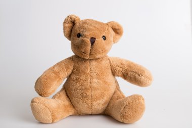 Oyuncak ayı ayrı tut moduyla arka plan üzerinde. yay şirin sanat güzel aşk kat b