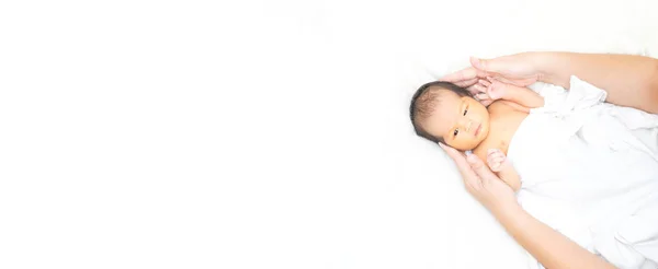 Cute newborn baby girl in white blanket on nursery bed. Adora — Stock Photo, Image