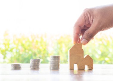 Money saving coins stack with growing interest in the public par