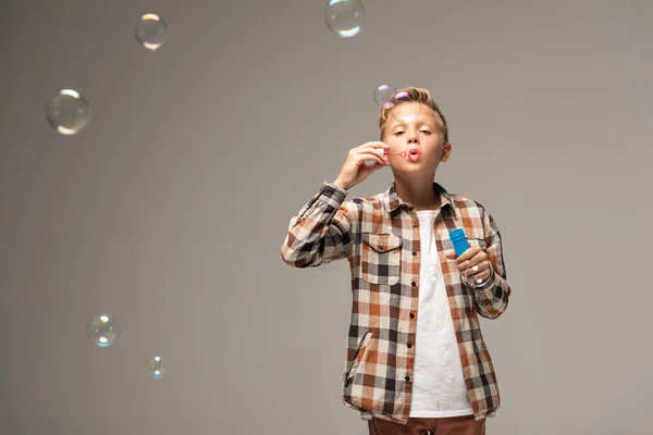 Boy Checkered Shirt Blowing Soap Bubbles Isolated Grey — Stock Photo, Image