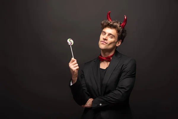 Handsome Man Halloween Devil Costume Holding One Lollipop Black — Stock Photo, Image