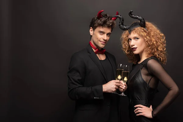 Beautiful Couple Posing Halloween Costumes Champagne Glasses Black — Stock Photo, Image