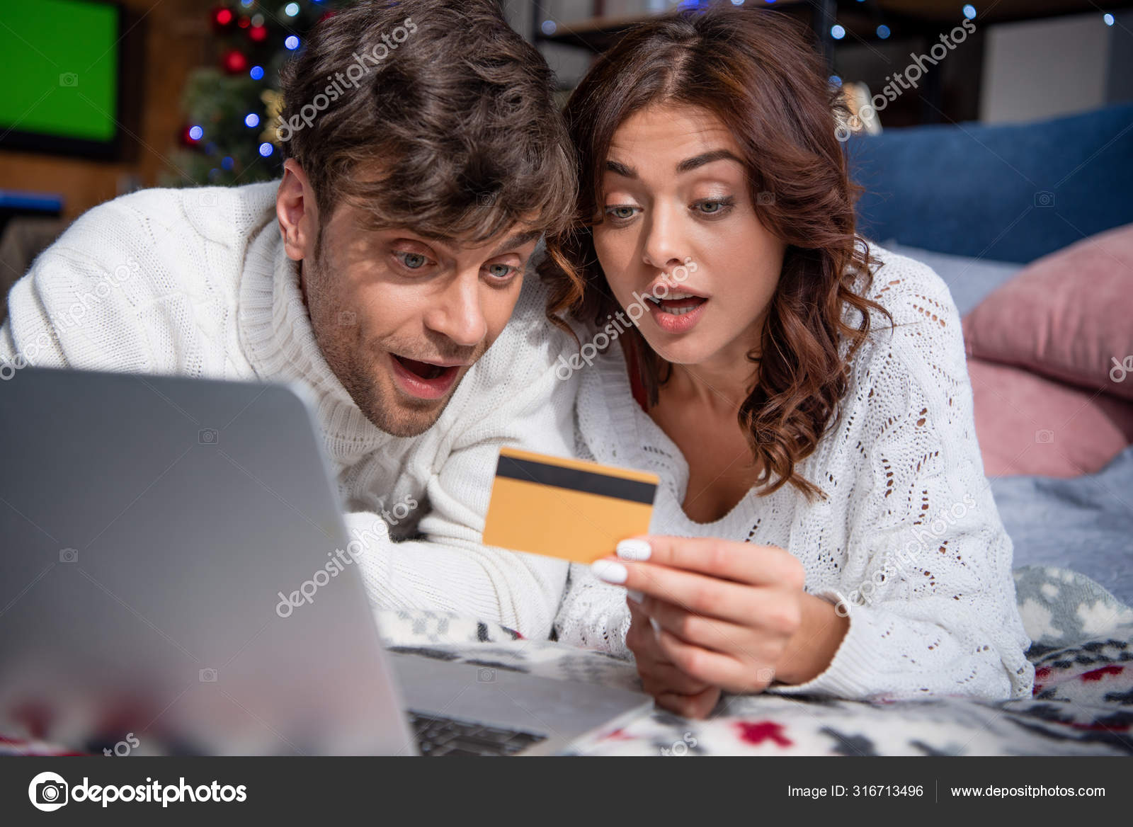 Shocked Girlfriend Handsome Boyfriend Sweaters Looking Credit Card Stock Photo by ©HayDmitriy
