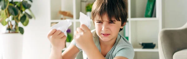 Panoramic Shot Irritated Kid Dyslexia Holding Crumpled Papers — Stock Photo, Image