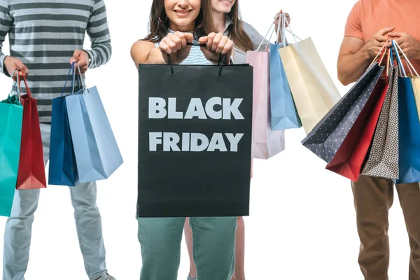 Vista Recortada Amigos Sosteniendo Bolsas Compras Viernes Negro Aislado Blanco —  Fotos de Stock