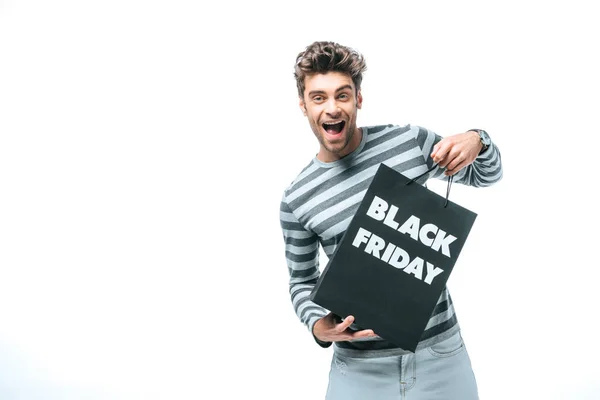 Hombre Emocional Sosteniendo Bolsa Compras Viernes Negro Aislado Blanco —  Fotos de Stock