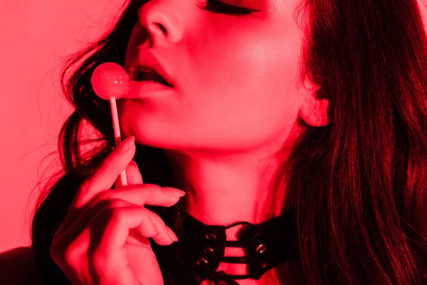 Attractive Seductive Woman Eating Lollipop Red Light — Φωτογραφία Αρχείου