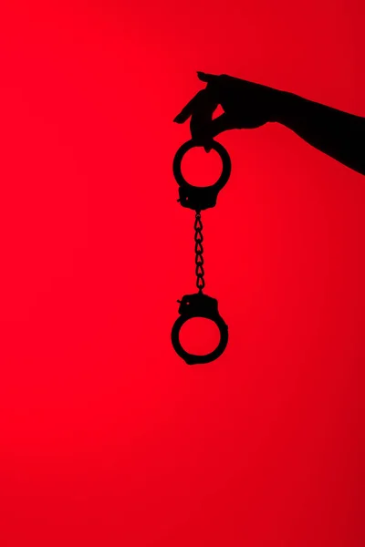 Cropped View Silhouette Seductive Girl Holding Handcuff Isolated Red — Stock Photo, Image