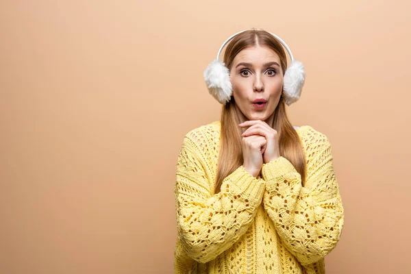 Beautiful Surprised Woman Yellow Sweater Ear Warmers Isolated Beige — Stock Photo, Image