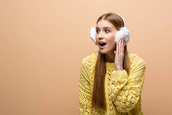 Attractive Excited Woman Yellow Sweater Earmuffs Isolated Beige — Stock Photo, Image