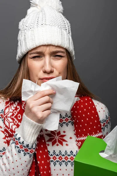 Beautiful Ill Woman Knitted Hat Sneezing Holding Paper Napkins Isolated — Stock Photo, Image