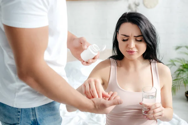 Husband Giving Pills Pregnant Wife Pain Bedroom — Stock Photo, Image