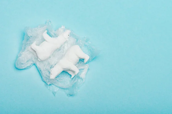 Top View Toy Polar Bears Polyethylene Bag Blue Background Environmental — Stock Photo, Image