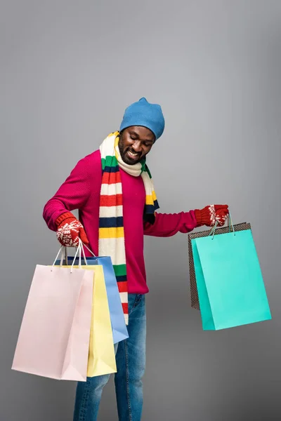 Happy African American Man Winter Outfit Shopping Bags Grey Background — Stock Photo, Image