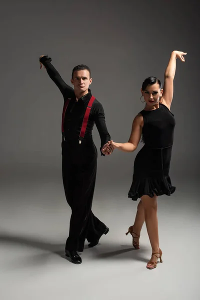 Elegant Dancers Black Clothing Looking Camera While Dancing Tango Grey — Stock Photo, Image
