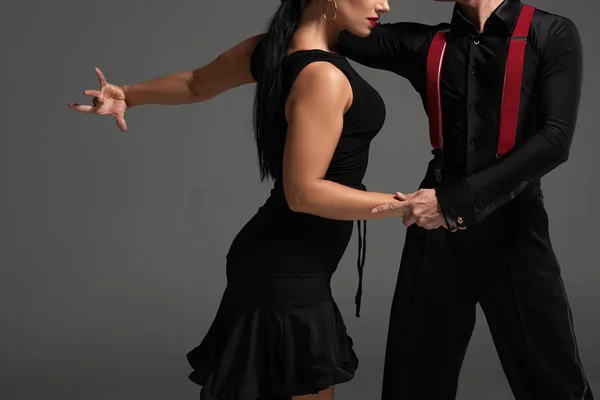 Vista Recortada Elegantes Bailarines Ropa Negra Realizando Tango Aislado Gris —  Fotos de Stock