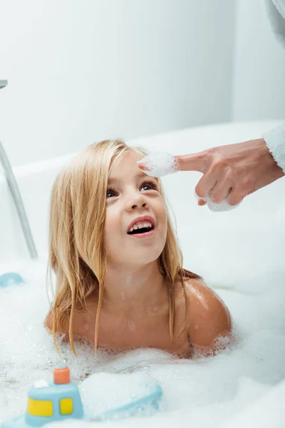 Cropped View Mother Bath Foam Finger Touching Nose Cute Daughter — Stock Photo, Image