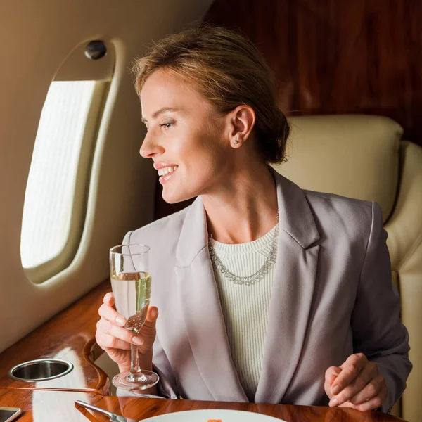 Cheerful Businesswoman Champagne Glass Private Jet — Stock Photo, Image