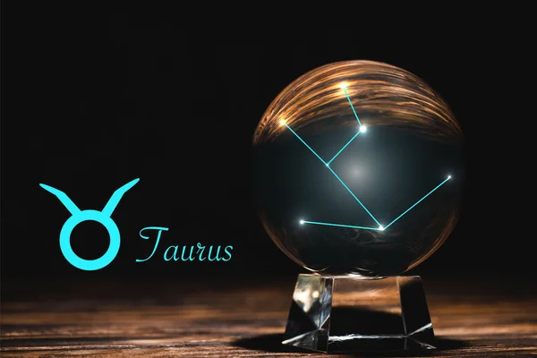 Crystal Ball Constellation Taurus Zodiac Sign Wooden Table Isolated Black — Stock Photo, Image