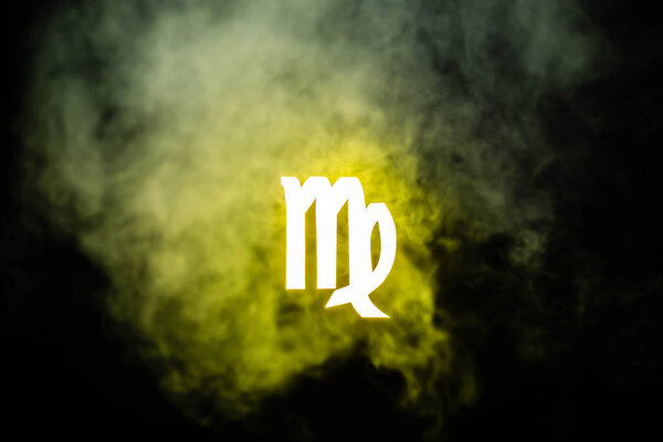 yellow illuminated Virgo zodiac sign with smoke on background