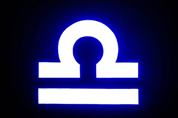 Голубой Подсвеченный Знак Зодиака Весы Изолированный Черном — стоковое фото