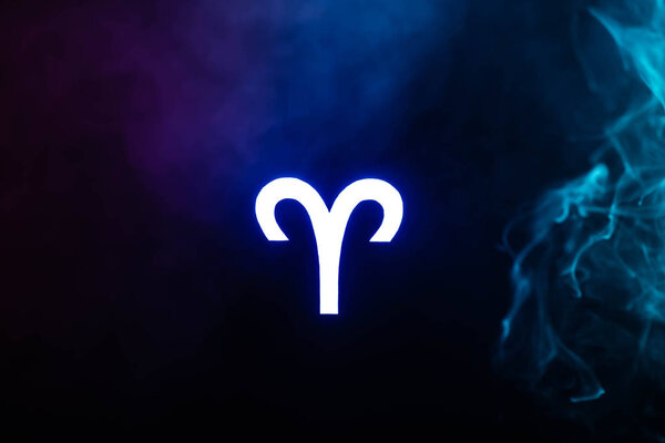 blue illuminated Aries zodiac sign with smoke on background