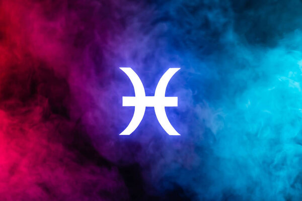 blue illuminated Pisces zodiac sign with colorful smoke on background