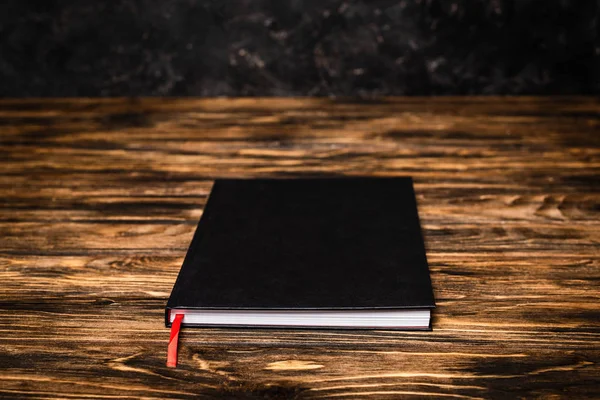 Black Book Wooden Table — Stock Photo, Image