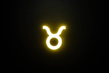 yellow illuminated Taurus zodiac sign isolated on black clipart