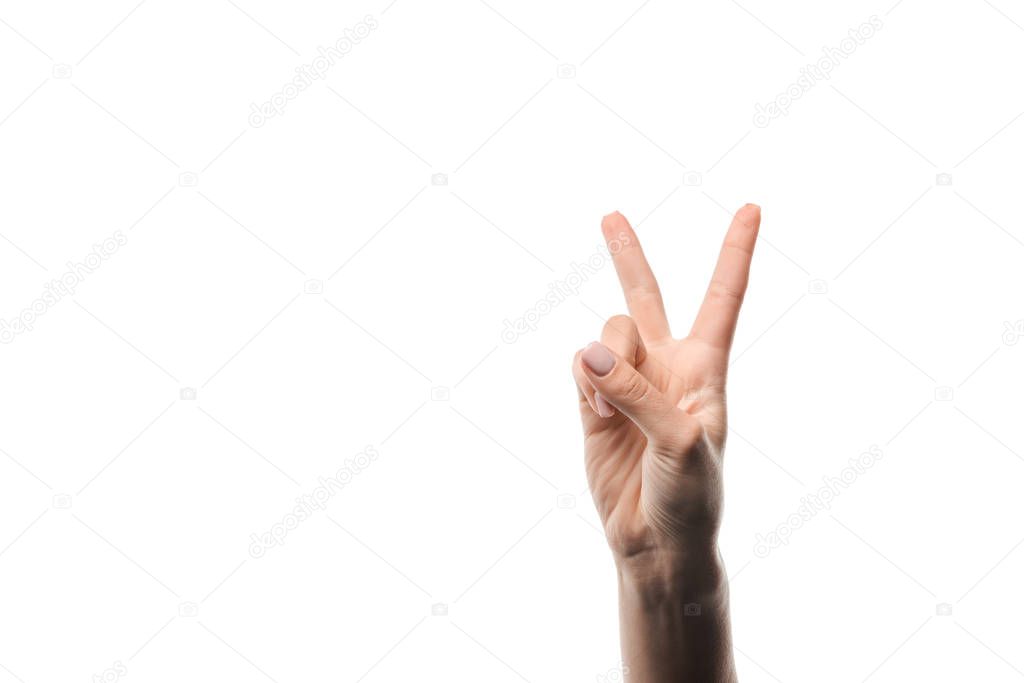cropped view of woman showing peace sign isolated on white 