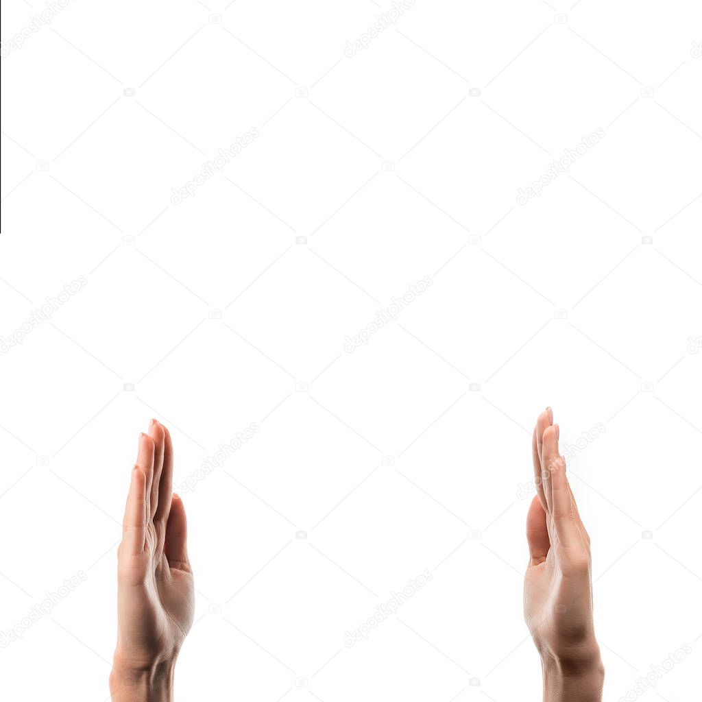 cropped view of woman with raised hands isolated on white 