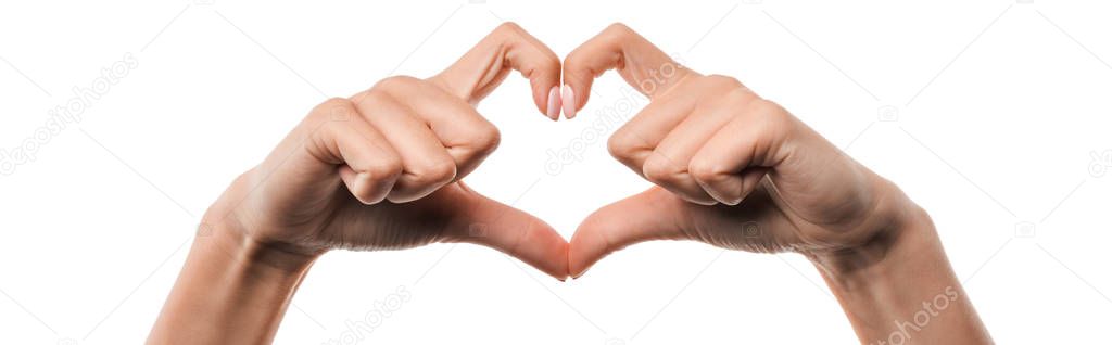 panoramic shot of woman showing heart-shape sign with fingers isolated on white 