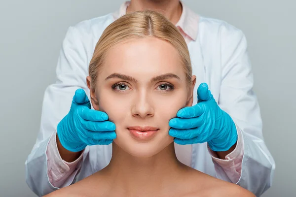 Cropped View Beautician Blue Latex Gloves Touching Cheeks Woman Isolated — Stock Photo, Image