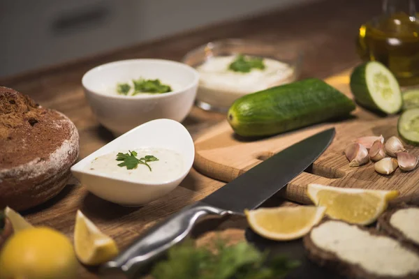 Selective Focus Delicious Tzatziki Sauce Raw Ingredients Kitchen Table — Stock Photo, Image