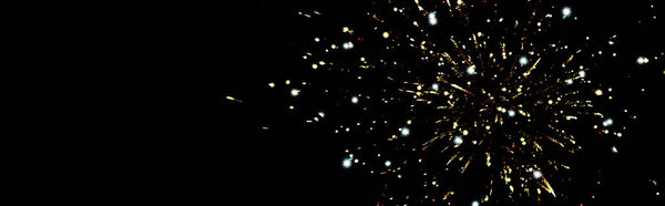 panoramic shot of golden fireworks in night sky, isolated on black