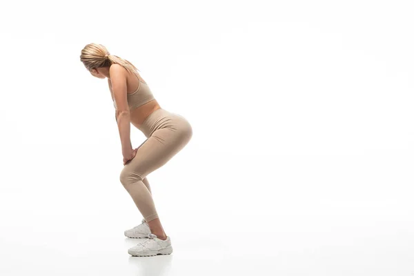 Boční Pohled Blondýny Dívka Béžové Legíny Twerking Izolované Bílém — Stock fotografie