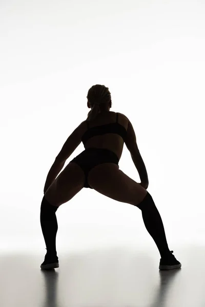 Back View Silhouette Sexy Girl Twerking Floor Isolated White — Stock Photo, Image