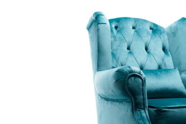 close up view of elegant velour blue armchair with pillow isolated on white clipart