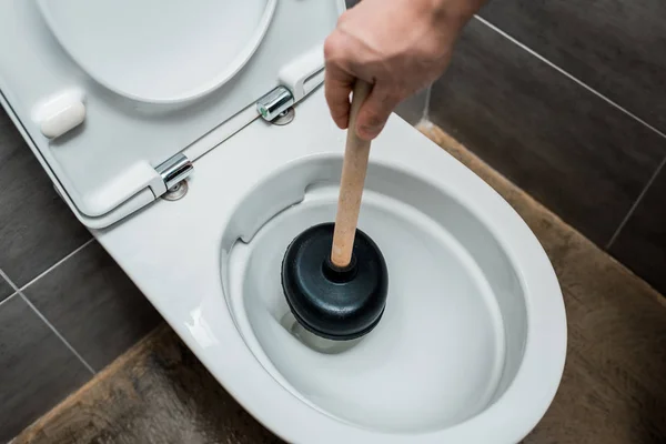 Cropped View Plumber Using Plunger Toilet Bowl Modern Restroom Grey — Stock Photo, Image