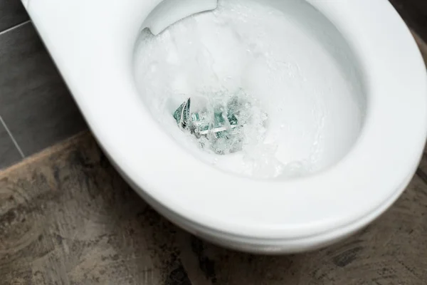 Clean White Toilet Bowl Flushing Money Modern Restroom Grey Tile — Stock Photo, Image