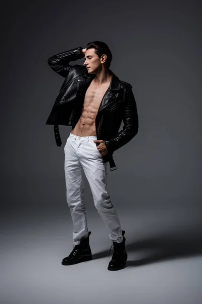 Young Sexy Man White Jeans Black Leather Jacket Grey — Stock Photo, Image