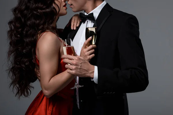 Cropped View Couple Hugging Holding Champagne Glasses Isolated Grey — Stock Photo, Image