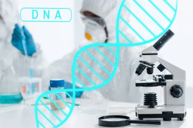 seçici odak noktası mikroskop ve DNA resimli büyüteç 