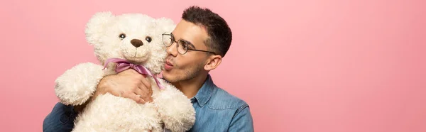 Panoramic Shot Young Man Kissing Teddy Bear Isolated Pink — Stock Photo, Image