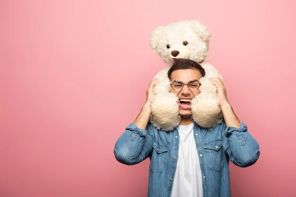 Laughing Young Man Looking Camera While Holding Teddy Bear Pink — 스톡 사진
