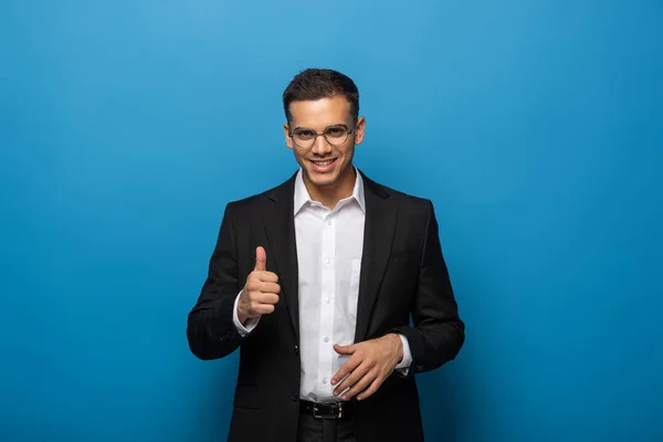 Smiling Businessman Showing Thumb Gesture Blue Background — Stock Photo, Image